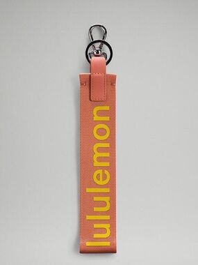 NWT Lululemon Never Lost Keychain Pink and Yellow